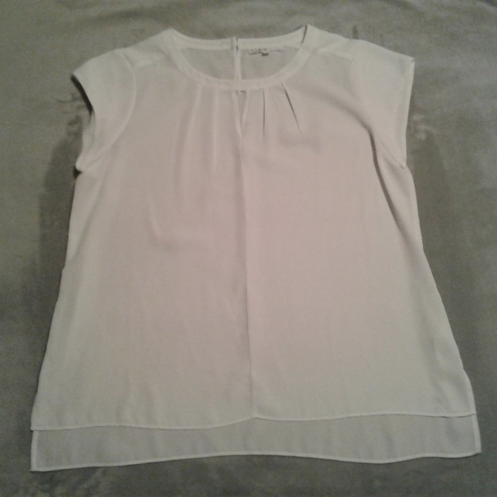 Cleo White Sleeveless Top